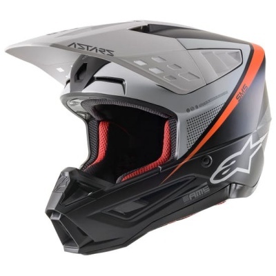 Capacete motocross preto e cinza com detalhes laranja e interior vermelho acolchoado