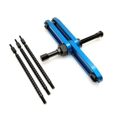 Ferramenta metálica azul com quatro hastes pretas para mecânica