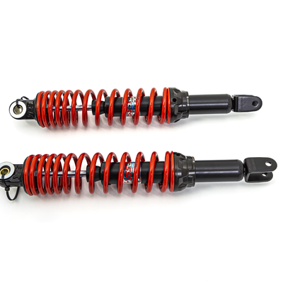 Par de amortecedores com molas vermelhas e corpo metálico preto
