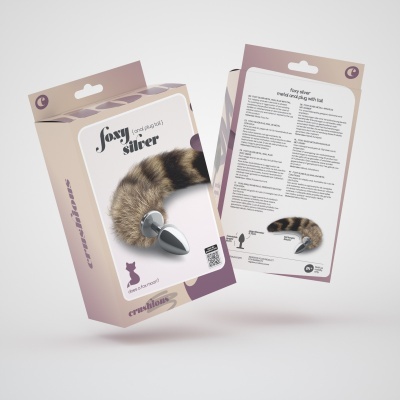 Embalagem de plug anal com cauda de pelo castanho e preto, base metálica prateada.