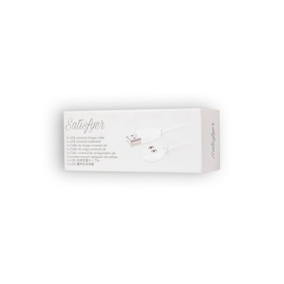 Caixa branca do produto Satisfyer com cabo USB e texto descritivo.