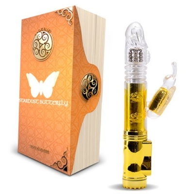Vibro massageador dourado com cabeça transparente e embalagem laranja com borboleta