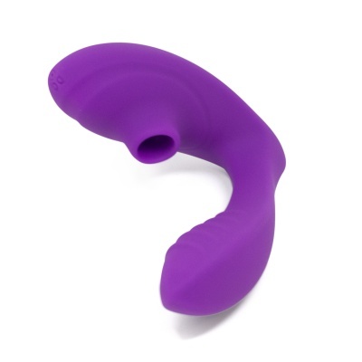 Brinquedo sexual roxo de silicone com formato curvado e textura texturizada.