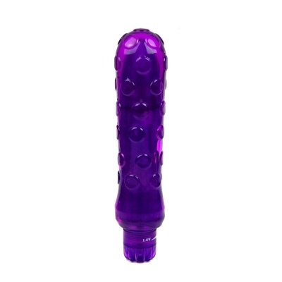 vibrador roxo texturizado em fundo branco