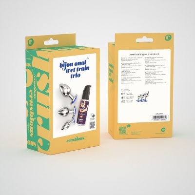 Conjunto de brinquedos sexuais com três plugues anais e lubrificante em embalagem amarela e verde.