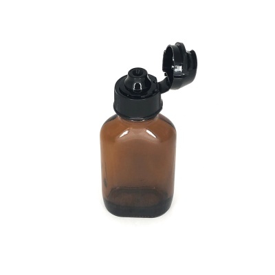 Frasco pequeno de plástico castanho com tampa preta
