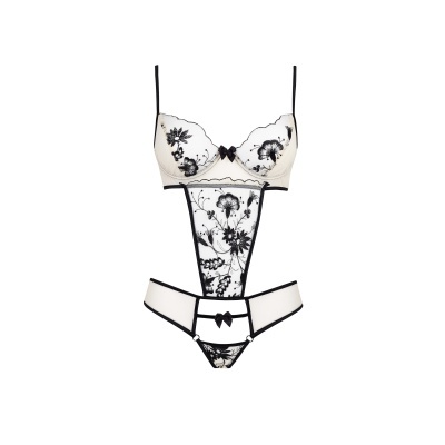 Conjunto de lingerie branco e preto com padrão floral em renda