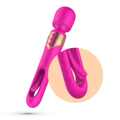 Vibrador cor-de-rosa com botão dourado e textura em silicone