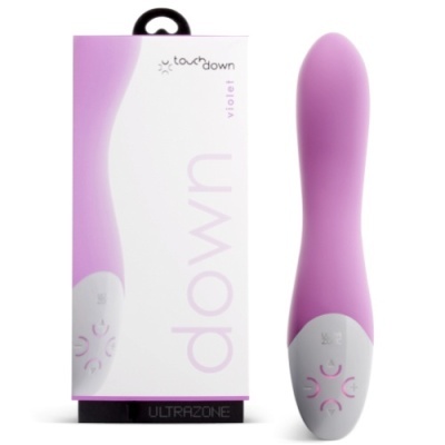 Vibrador violeta com base branca e embalagem branca com texto 'touch down violet'