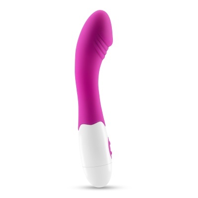 Vibrador rosa com base branca em fundo branco