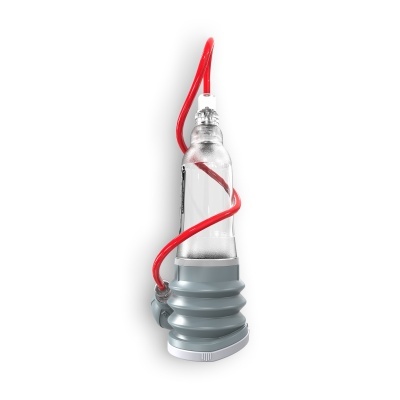 Dispositivo transparente com base cinzenta e tubo vermelho enrolado