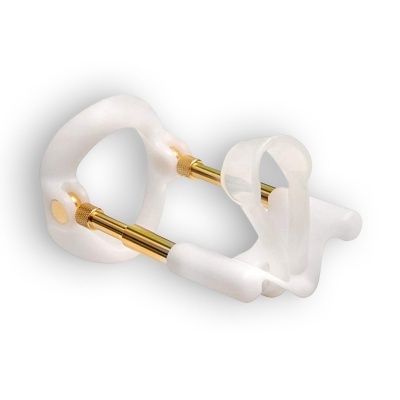 Dispositivo translúcido branco com partes metálicas douradas