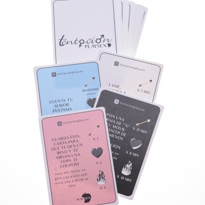 Cartas de jogo 'tentación PLAYSX' coloridas com texto e símbolos
