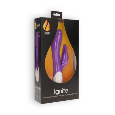 Caixa preta com vibrador roxo e branco visível e texto Ignite da marca heat
