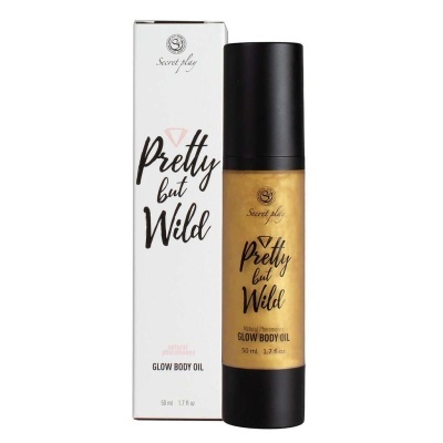 Frasco de óleo corporal dourado e caixa branca com texto Pretty but Wild