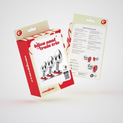 Caixas vermelhas e brancas com plugues metálicos prateados e base vermelha para treino anal