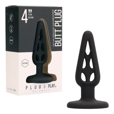 Plug anal preto de silicone com orifícios ao lado de embalagem