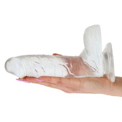 Dildo transparente texturizado com ventosa.