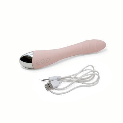 Vibrador cor de rosa com cabo USB branco sobre fundo branco