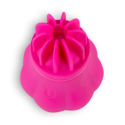 Objeto de silicone rosa arredondado com hastes verticais no topo