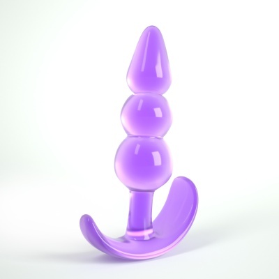 Produto roxo translúcido em silicone com esferas e base curva sobre fundo branco