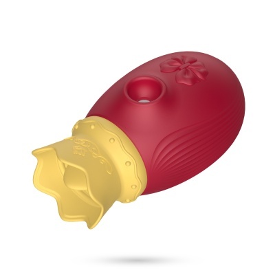 Brinquedo formato morango vermelho com tampa amarela em forma de coroa