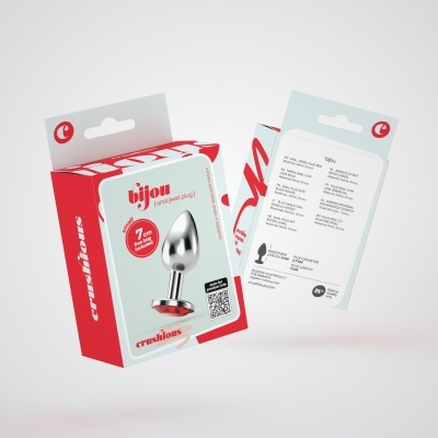Embalagem vermelha e branca com plug anal prateado e texto 'bijou (anal jewel plug) 7 cm'