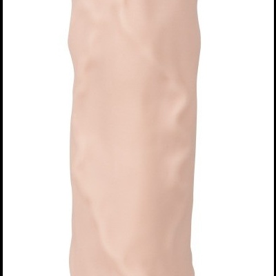 Brinquedo cilíndrico de cor bege claro com textura