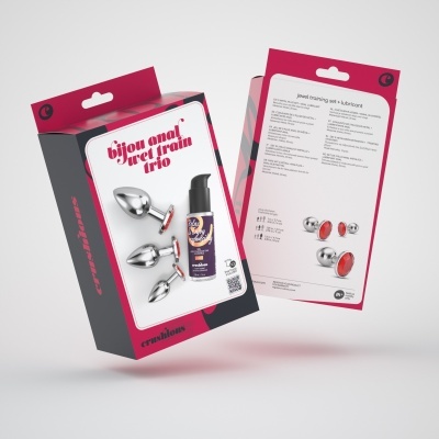 Conjunto de três plugues anais metálicos com lubrificante em embalagem