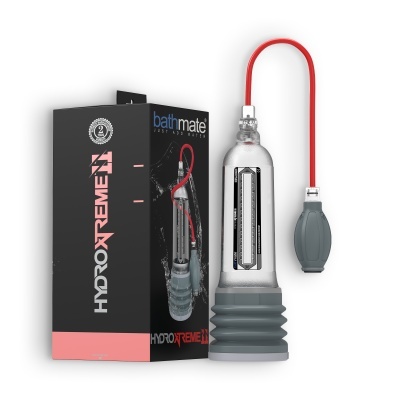 Bomba de vácuo transparente com borracha cinza e tubo vermelho ao lado da caixa preta com texto HYDROXTREME