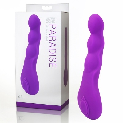 Vibrador roxo texturizado ao lado da caixa branca com texto Ultra Zone Paradise