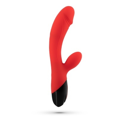 Vibrador vermelho e preto com estimulador adicional sobre fundo branco
