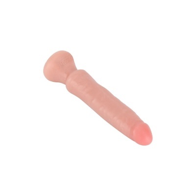 Produto sexual em silicone cor de pele com base plana sobre fundo branco