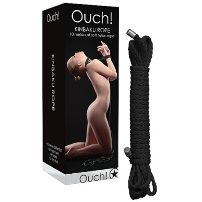 Caixa preta com corda preta enrolada e texto Ouch! KINBAKU ROPE