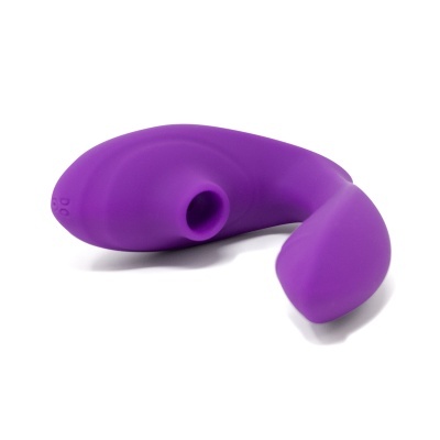 Objeto roxo em silicone com forma ergonómica e abertura circular