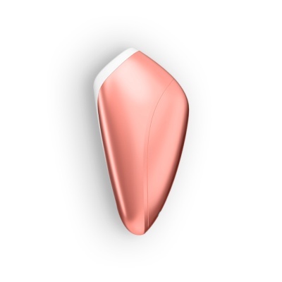 Dispositivo eletrónico rosa e branco sobre fundo branco