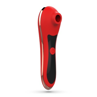 Dispositivo vermelho e preto com botão e orifício circular