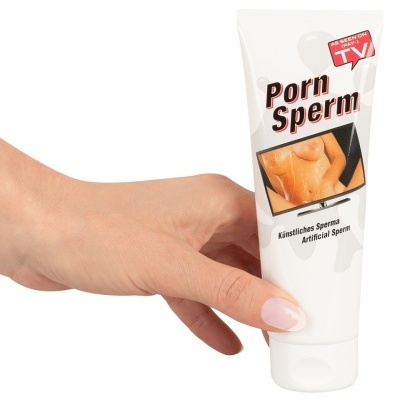 Tubo branco do produto Porn Sperm com imagem e texto em várias línguas