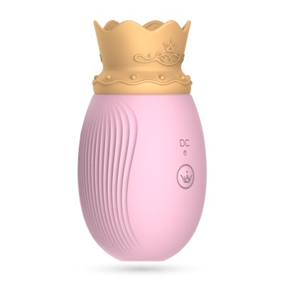 Dispositivo de mão rosa com tampa coroa dourada e texto DC