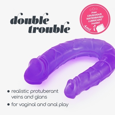 Brinquedo sexual roxo em forma de U com selo vermelho de lubrificante