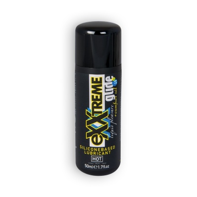 Frasco preto de lubricante de silicone com tampa preta e rótulo amarelo e branco