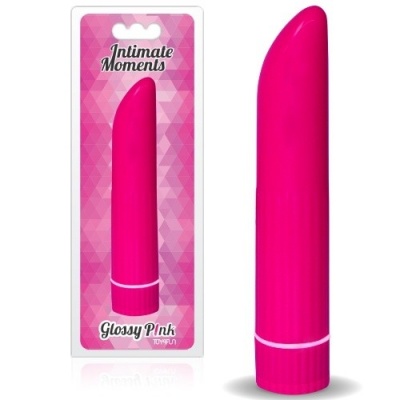 Vibrador cor-de-rosa brilhante embalado em blister com fundo rosa geométrico