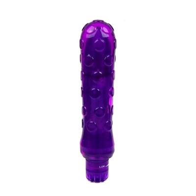 vibrador roxo texturizado em fundo branco