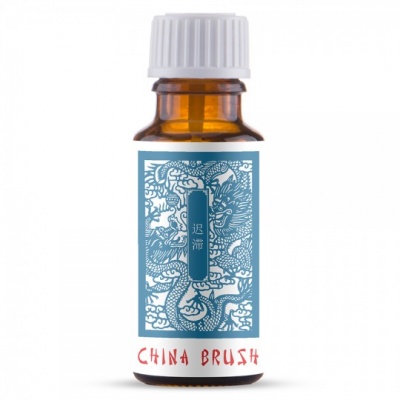 Frasco de vidro âmbar com rótulo azul e tampa branca