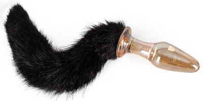 Plug anal translúcido dourado com rabo preto felpudo