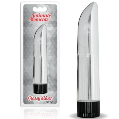 Vibrador prateado com base preta em embalagem blister