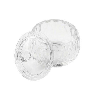 Recipiente de vidro transparente com tampa e textura facetada