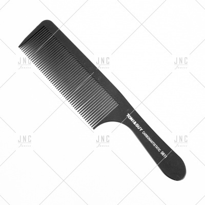 Pente preto de plástico com dentes duplos e inscrição YOKI&GUY