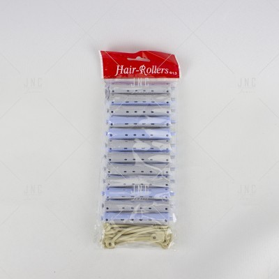 Conjunto de rolos de cabelo azuis com pontos pretos e presilhas bege, embalados com cartão vermelho