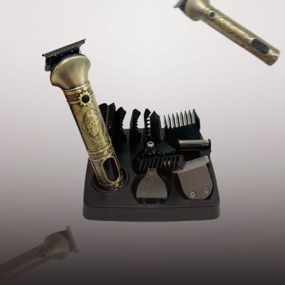 Máquina de cortar cabelo dourada com suporte de acessórios preto